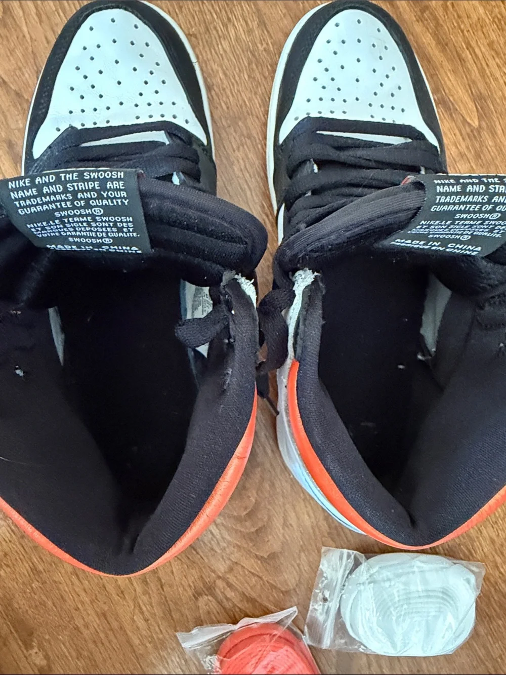 Nike High-Top Sneakers in Black, White & Orange Accents